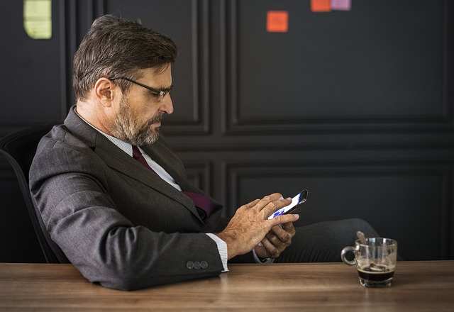 man with mobile on work